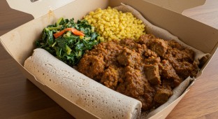 Siga Alicha with Gomen, Bulgur Wheat and Injera
