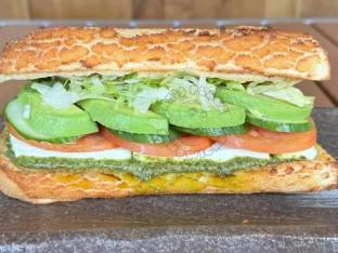 Your Favorite Peanuts Character Sandwich on Dutch Crunch With Fruit Salad