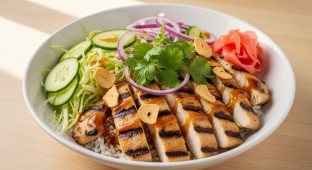 Regular Grilled Chicken over White Rice with Cucumber, Sweet Onion, Cabbage, Cilantro, Pickled Ginger and Garlic Crisps