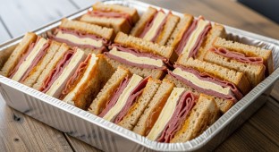 GLUTEN FREE Turkey Cuban Hickory Double House Smoked Turkey Breast, Swiss Cheese, Sliced Pickles, Prosciutto, Tomatoes, Russian Dressing