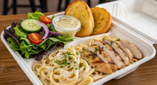 Fettuccine Alfredo With Grilled Chicken with a House Salad and Garlic Bread