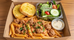 Penne Alla Vodka With Italian Sausage with a House Salad and Garlic Bread