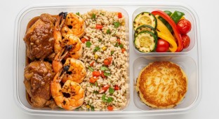 Braised Chicken & Grilled Prawns with Rice, Grilled Vegetables, and Potato Cake