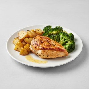 Roasted Lemon Herb Chicken with Roasted Potatoes and Steamed Broccoli with a Citrus Vinaigrette.