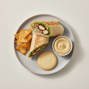 Chicken Kofte Wrap Lunch with Pita Chips, Hummus, and a Sugar Cookie