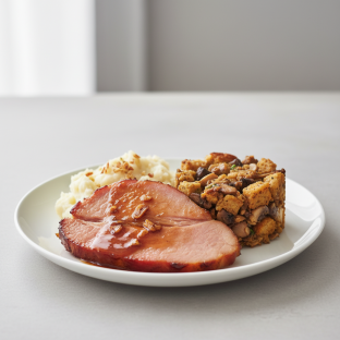 Bourbon Glazed Ham with Garlic Mashed Potatoes and Brown Butter Stuffing