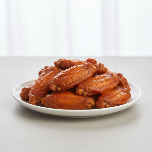 Tangy Buffalo Chicken Wings Tangy Buffalo Chicken Wings