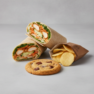 Buffalo Chicken Wrap with a Bag of Chips and a Chocolate Chip Cookie
