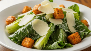 Traditional Caesar Salad with Romaine, Parmesan Reggiano, Spicy Focaccia Croutons