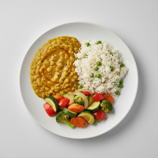 Dal Yellow Tadka with Peas Pulao and Tawa Vegetables