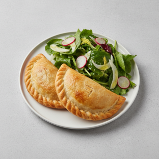 Two Humita Empanadas with Mixed Green Salad