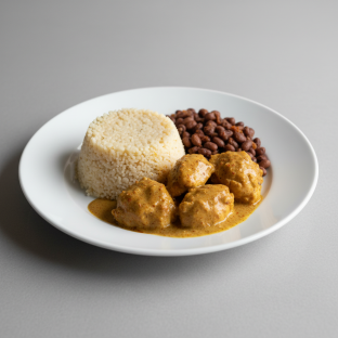 Curry Stew Chicken with Attieke (Cassava Couscous) and Black-Eyed Peas