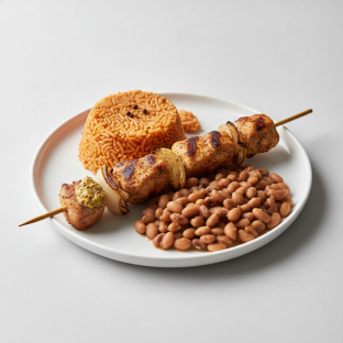 Brochette Chicken with Jollof Rice and Black-Eyed Peas