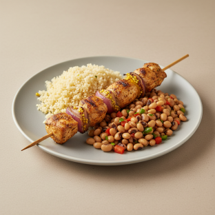 Brochette Chicken with Attieke (Cassava Couscous) and Black-Eyed Peas