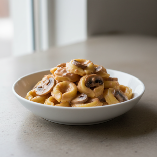 Cheese Tortellini with Vodka Sauce and Mushrooms
