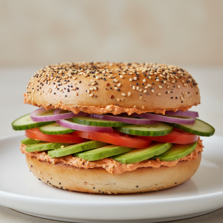 Garlic Chili Crisp Cream Cheese, Veggie and Avocado Sandwich - Everything Bagel Garlic Chili Crisp Cream Cheese, Veggie and Avocado Sandwich - Everything Bagel