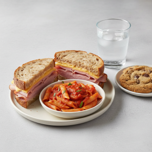 Ham and Cheese Sandwich, Tomato Basil Penne, Cookie, Water Ham and Cheese Sandwich, Tomato Basil Penne, Cookie, Water
