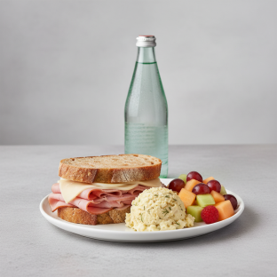 Ham and Cheese Sandwich, Potato Salad, Fruit, Sparkling Water Ham and Cheese Sandwich, Potato Salad, Fruit, Sparkling Water