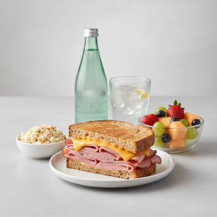 Ham and Cheese Sandwich, Coleslaw, Fruit, Sparkling Water Ham and Cheese Sandwich, Coleslaw, Fruit, Sparkling Water