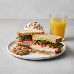 Turkey Sandwich with Coleslaw, Cookie, Orange Juice Turkey Sandwich with Coleslaw, Cookie, Orange Juice
