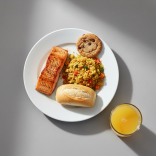 Asian Salmon, Curried Vegetable Couscous, Cookie, Orange Juice Asian Salmon, Curried Vegetable Couscous, Cookie, Orange Juice