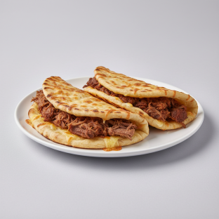 Nihari Birria Taco and Chipotle Keema Taco