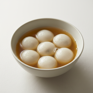 Sweet Rice Balls Stuffed with Sesame in Soup Sweet Rice Balls Stuffed with Sesame in Soup