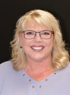 Travel agent Anne in England office