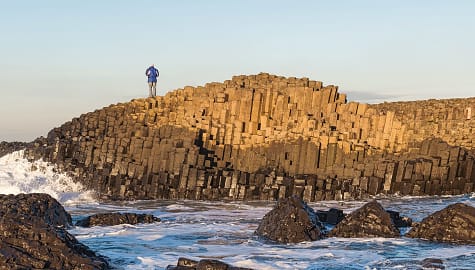 Senior tourist at Giants Causeway in Northern Ireland