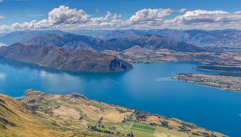 View of Lake Wanaka and surrounding mountains from Roys Peak, on the South Island of New Zealand.