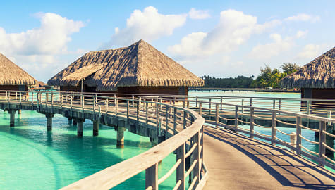Overwater bungalows on a Tahiti vacation