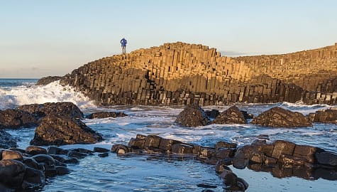Senior tourist at Giants Causeway in Northern Ireland
