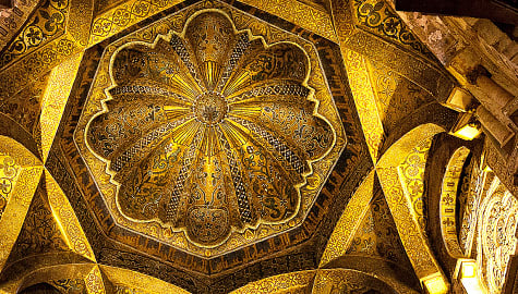 Architectural detail showcasing the golden dome of the Mosque of Cordoba