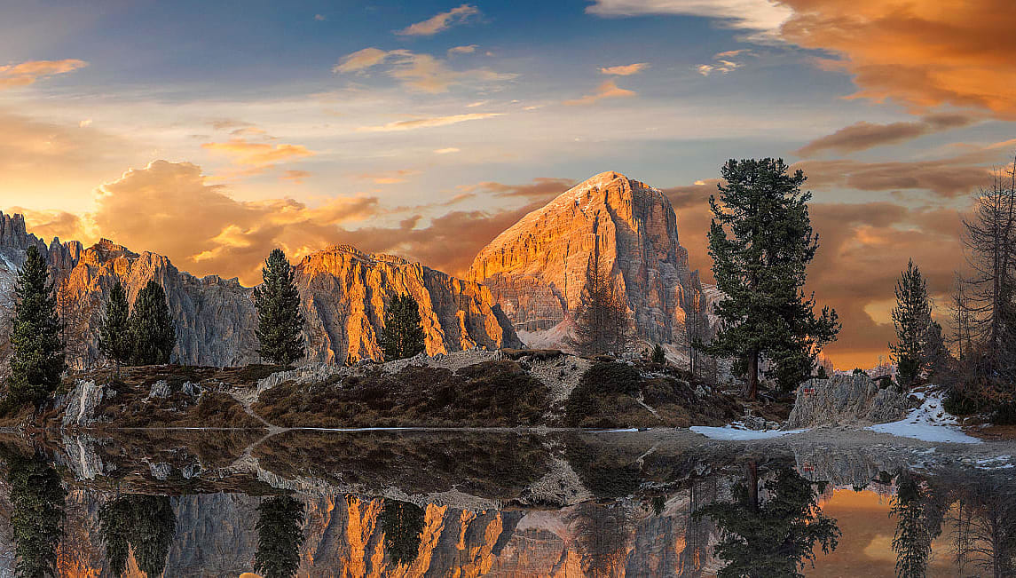 Amazing autumn sunset over Lago di Limides in the Dolomites, Italy.