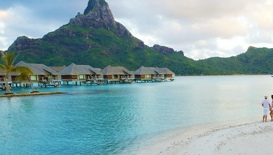 View of Bora Bora bungalows from beach.