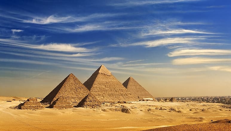 Distant view of the Great Pyramids of Giza in Egypt