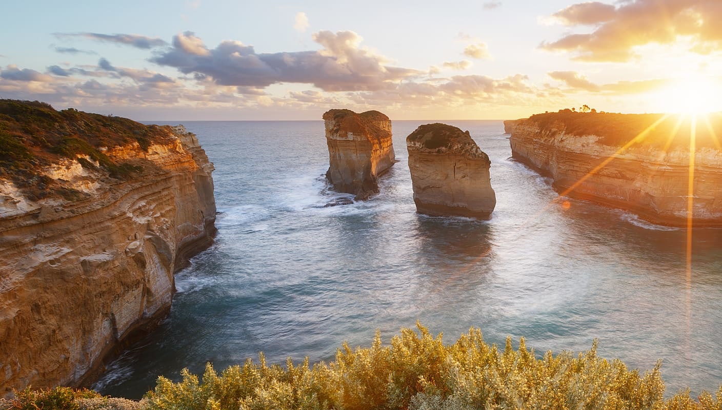 Sunsetting behind Loch Ard Gorge, part of Port Campbell National Park in Victoria, Australia