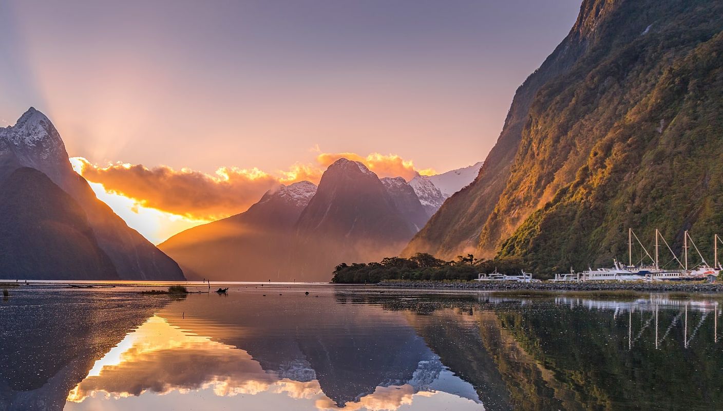 The sun bend Mitre Peak in Milford Sound, New Zealand