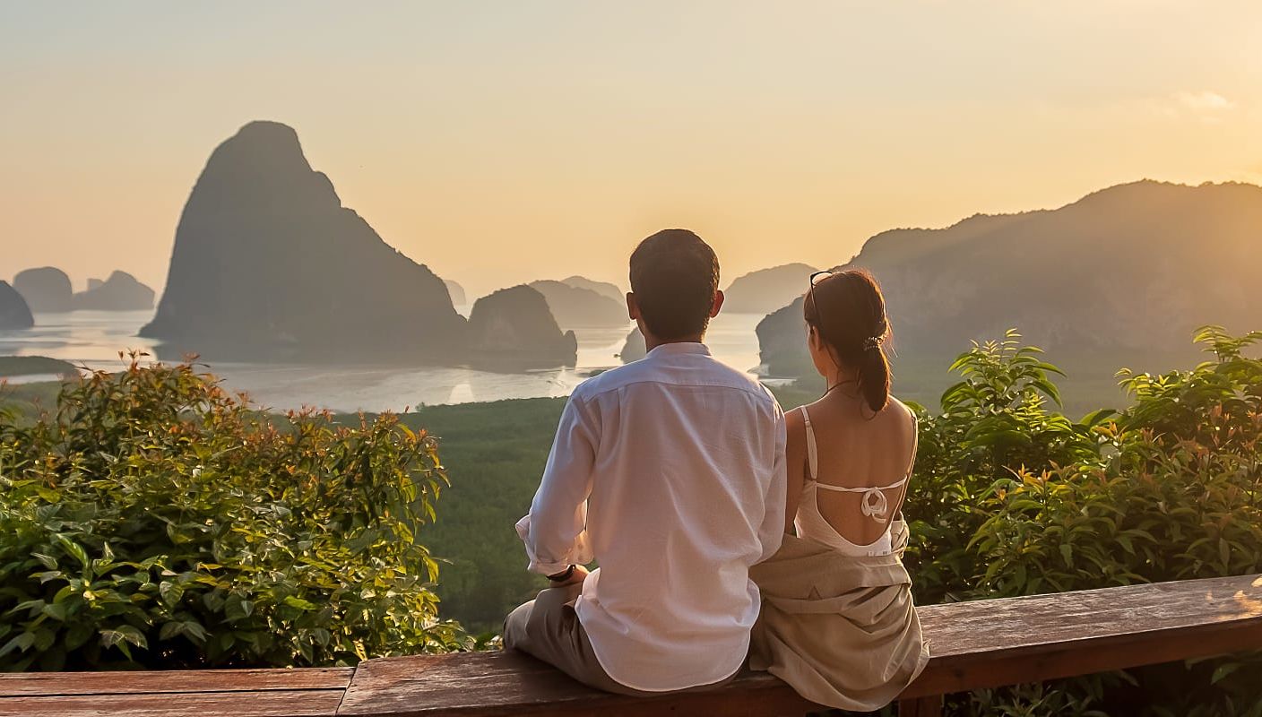 Couple looking at Phang Nga Bay, Thailand.