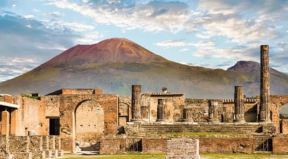 Ancient Roman city of Pompeii and Vesuvius in the background