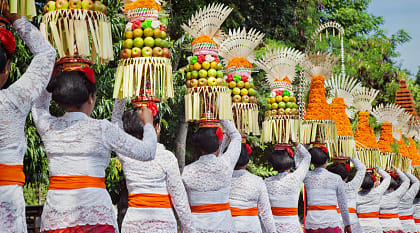 Balinese women in traditional costume during arts and culture festival in Bali