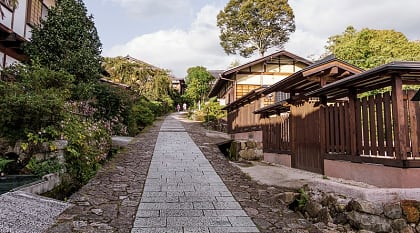 Walking through old town of Magome along the Nakasendo Trail in Japan