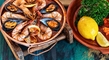 Authentic Culinary Tour of Portugal - Seafood Cataplana Seafood Cataplana, traditional Portuguese stew served in the Algarve region of Portugal