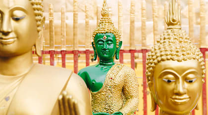 Statues in the golden Temple in Thailand