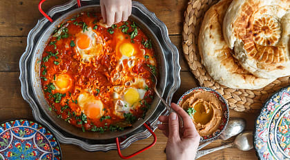 Traditional Shakshuka dish and bread served at a restaurant in Israel