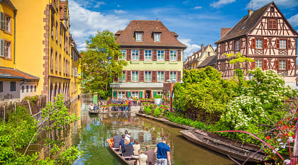 Colorful traditional houses on idyllic river in Colmar, Alsace Region, France