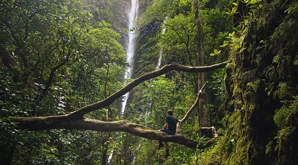 Solo hiker at Alajuela waterfall in Costa Rica