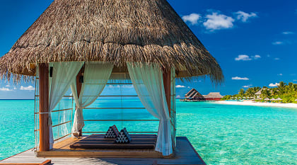 Romantic spa bungalow over the water in Tahiti.