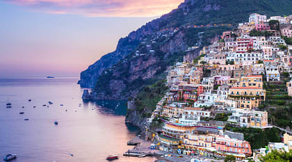 Hillside town of Positano looking out to the mediterranean at sunset in Italy's Amalfi Coast