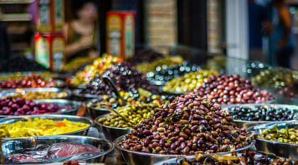 Discover the Flavors of Israel: 9-Day Culinary Tour Olives for sale at Sarona Market in Tel-Aviv, Israel
